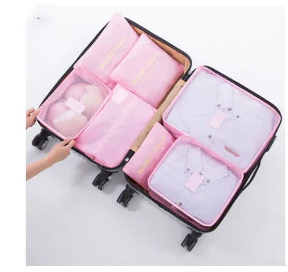 Durable waterproof packing cubes in various colors for organized, efficient travel