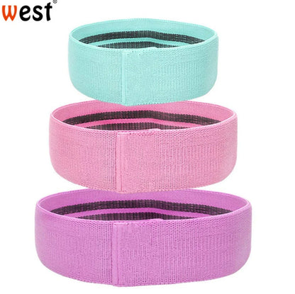 Latex mesh squat resistance band in lake blue, pink, and purple for hip and leg strengthening