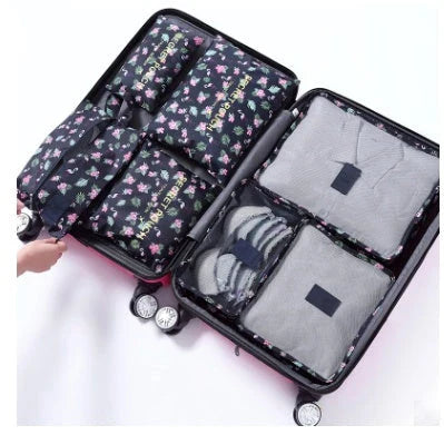 Durable waterproof packing cubes in various colors for organized, efficient travel