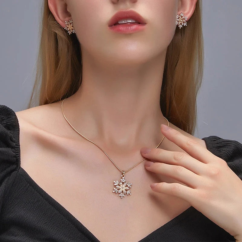 3-piece snowflake necklace set with rhinestone earrings and clavicle chain pendant in gold and silver