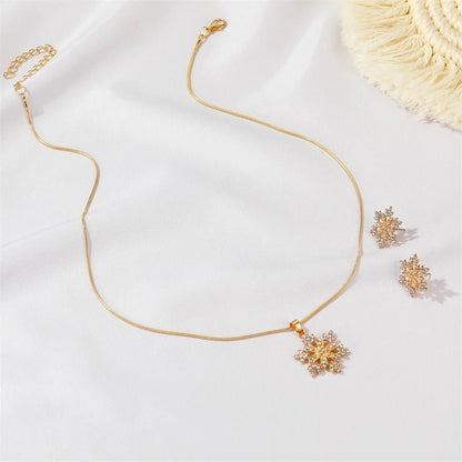 3-piece snowflake necklace set with rhinestone earrings and clavicle chain pendant in gold and silver