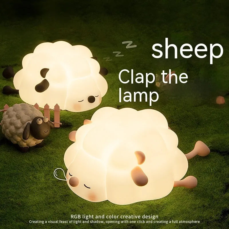 Cute silicone night light sheep cartoon bedroom lamp with warm light, rechargeable, on a bedside table