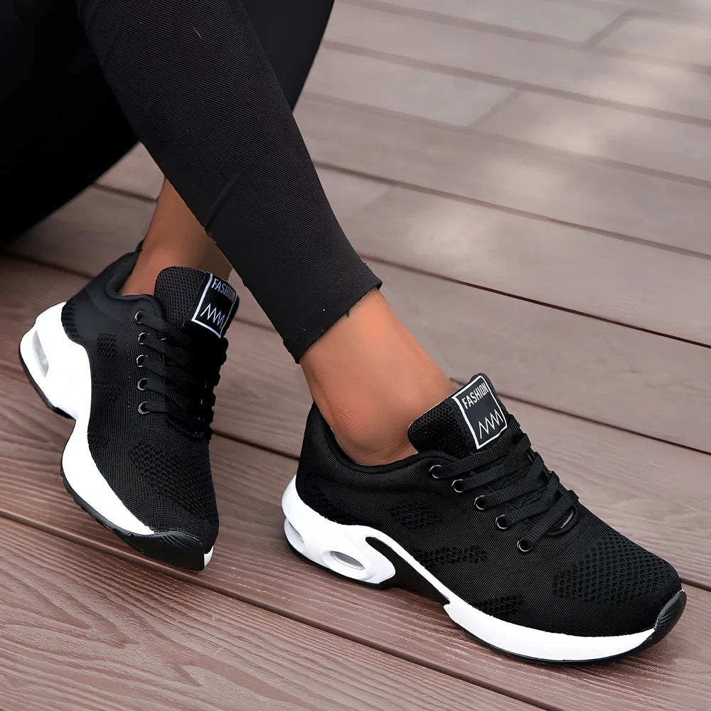 Women's lightweight leisure sports shoes in black with mesh upper and air cushion sole, sizes 35-44