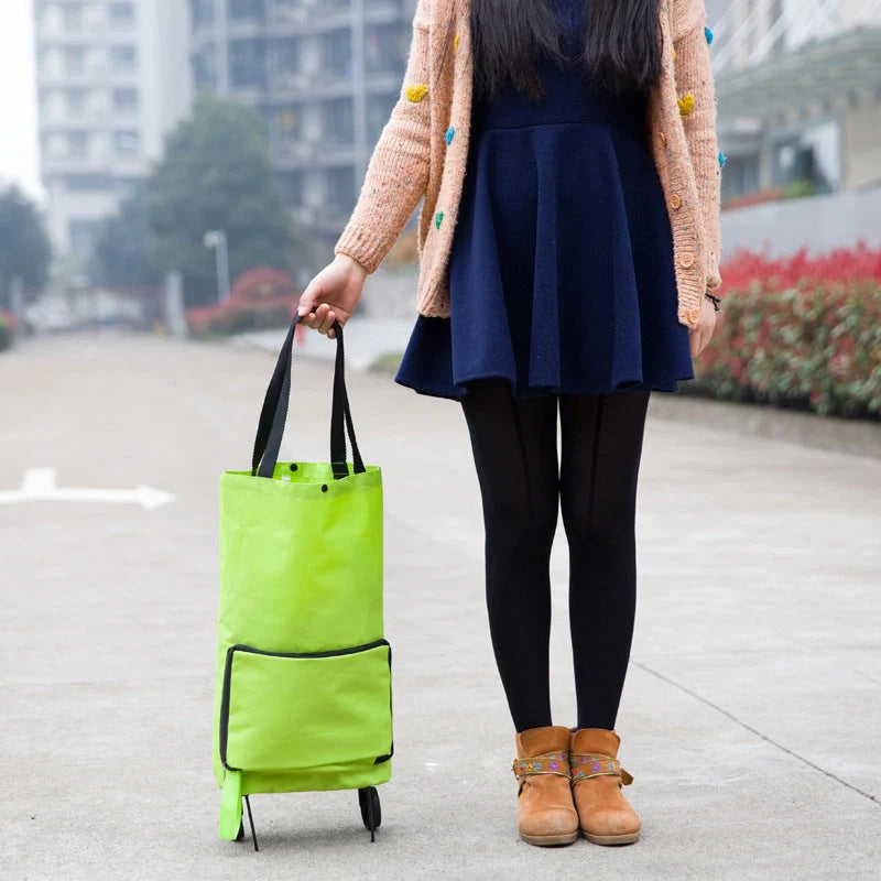 Foldable shopping cart with wheels in various colors, showing transformation from bag to cart