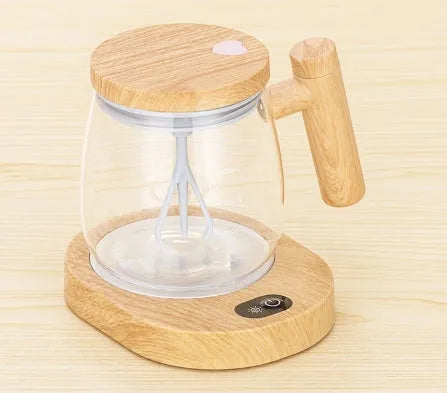 400ml automatic self-stirring coffee mug in borosilicate glass with electric mixing button.