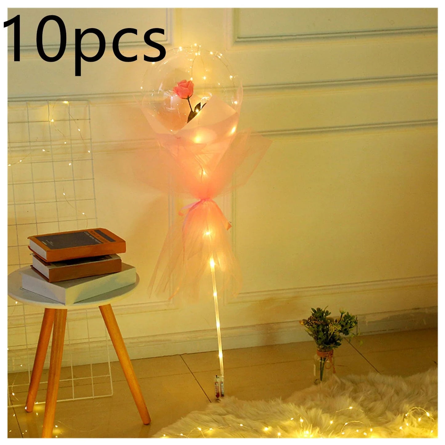 A captivating bouquet of LED-lit balloons and rose blooms, creating a mesmerizing ambiance for any celebration.