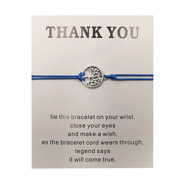 Hand-woven red rope Tree of Life bracelet with adjustable sizing