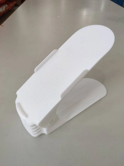 Adjustable double shoe rack made of durable polypropylene with customizable height to organize your shoe collection