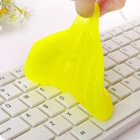 Blue and yellow Magic Cleaning Gel tubes for household and car dust removal.