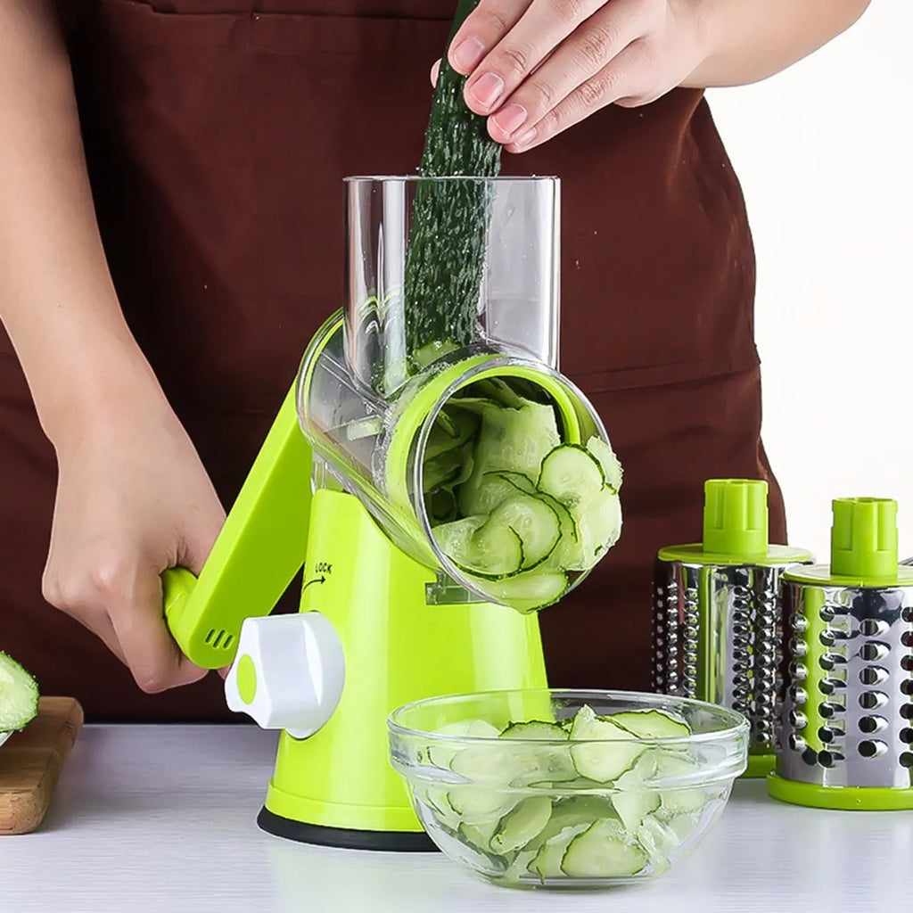 Round mandoline vegetable slicer with three stainless steel blades and suction base