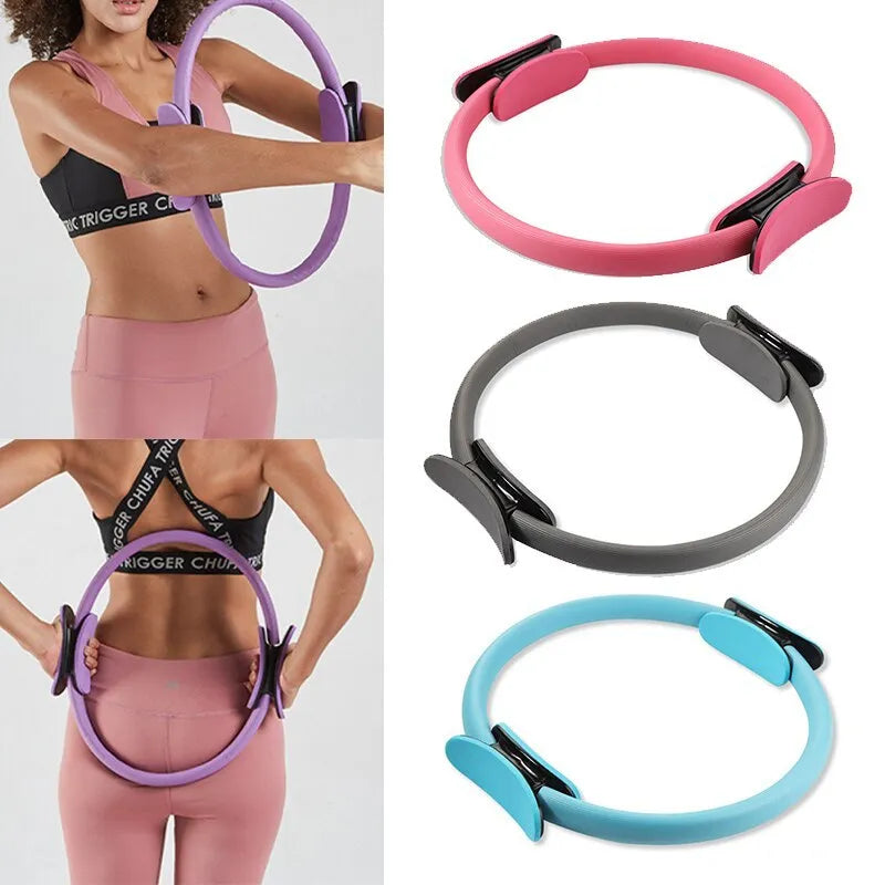 Pink Pilates ring with ergonomic curve on floor for core strength and posture exercises