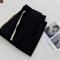 Men's loose straight casual summer pants in beige with drawstring waistband