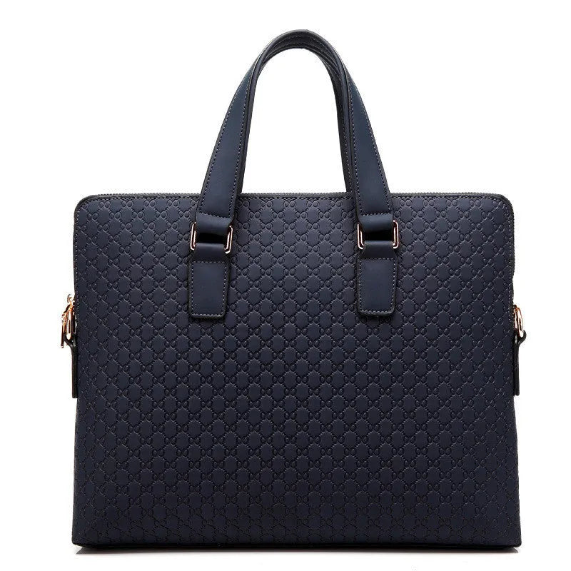 Genuine leather men's business handbag in blue with embossed geometric pattern, soft handles, and zipper closure, designed for a 14-inch laptop
