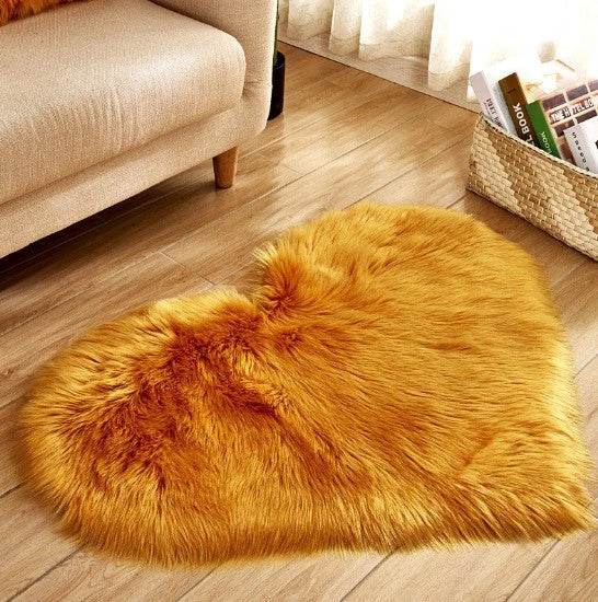 Soft, plush heart-shaped rug in various colors and sizes for comfortable home decor