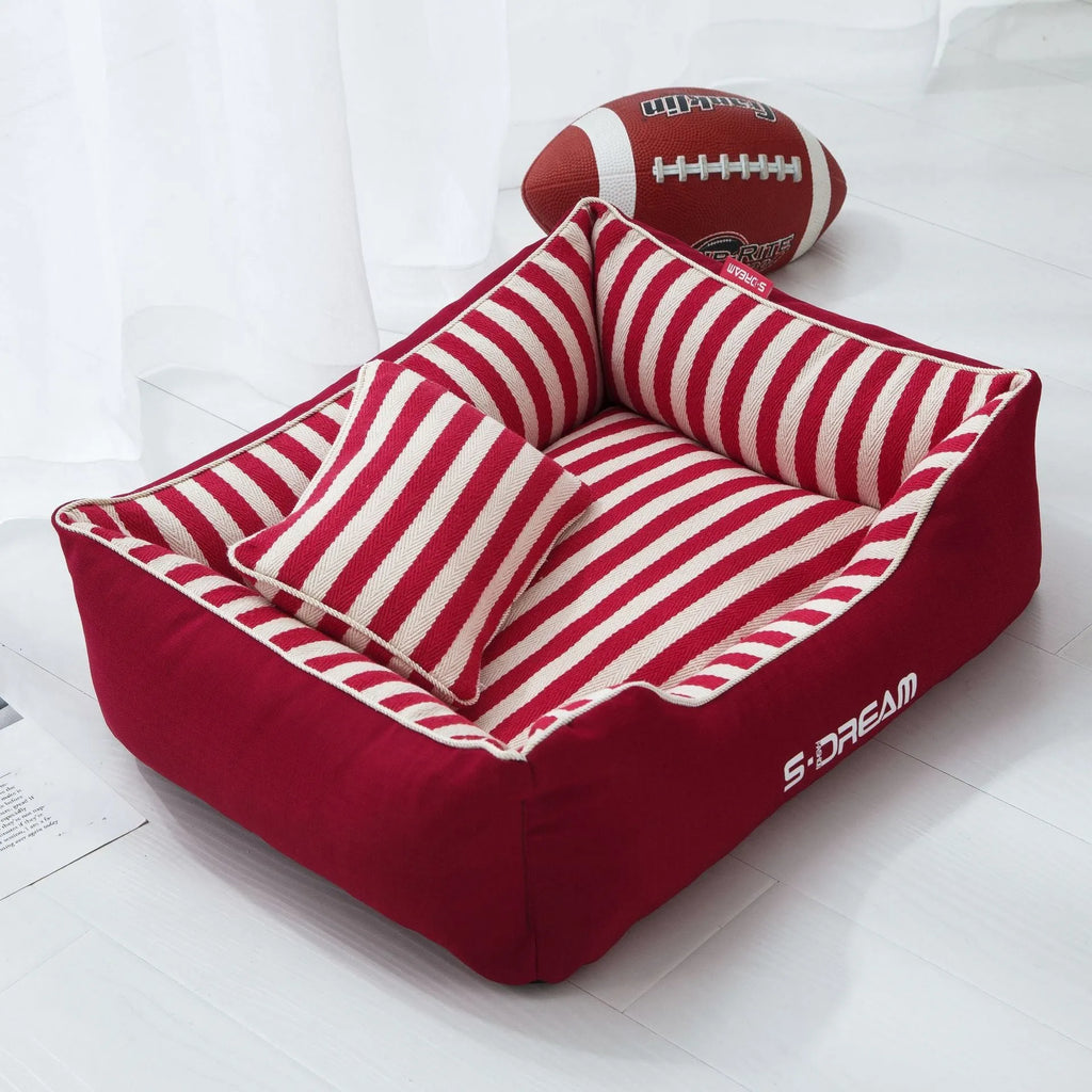 Navy striped washable dog kennel mat with a removable cover and a matching mini pillow.