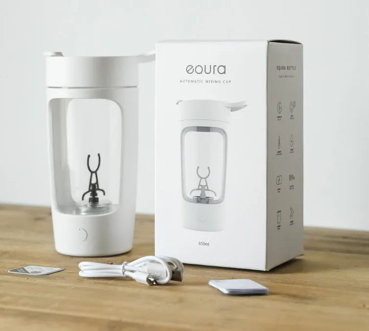 Cordless portable blender in blue with a 650ml blending cup and lid.