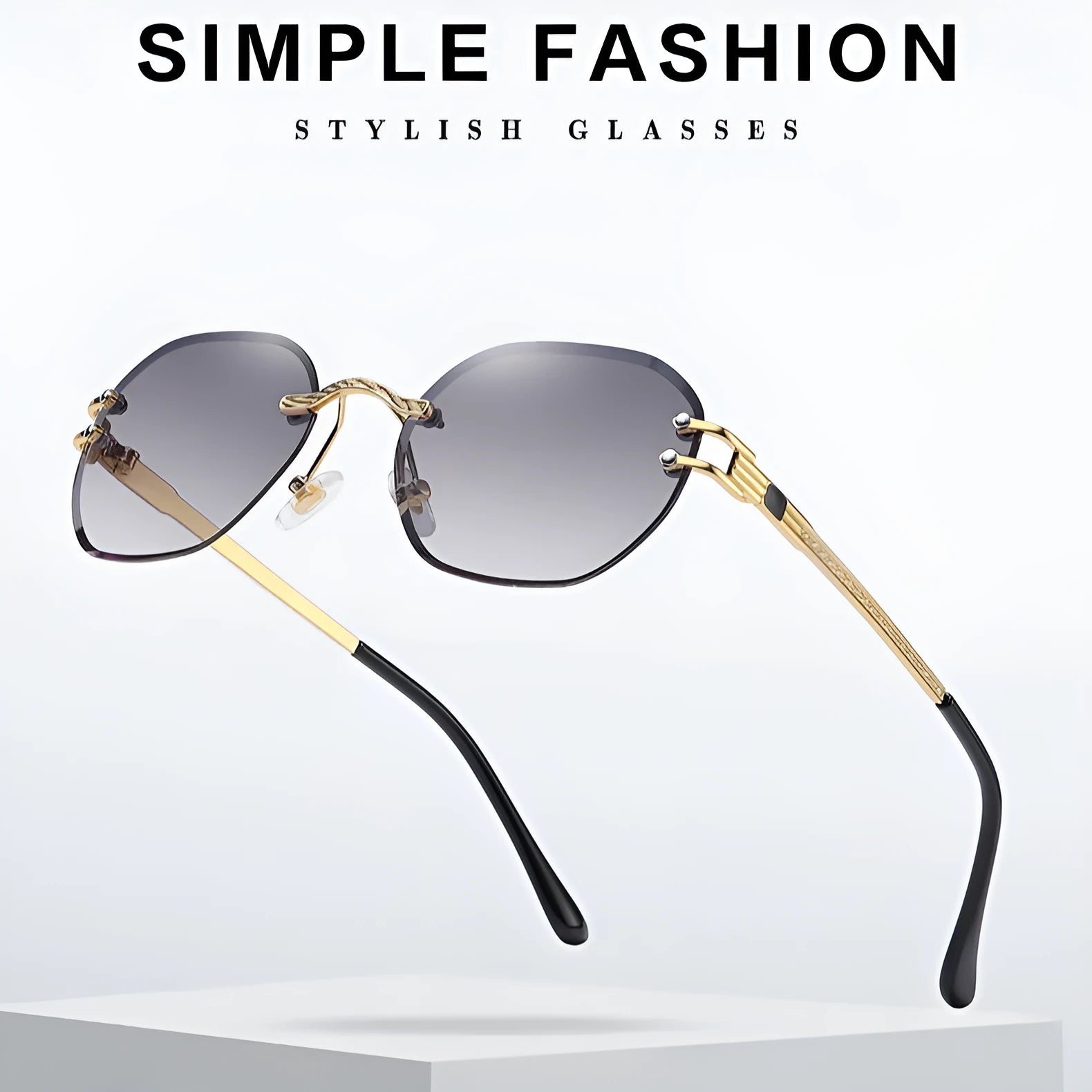 Gold metal frame trimming sunglasses with gradient blue lenses on white background