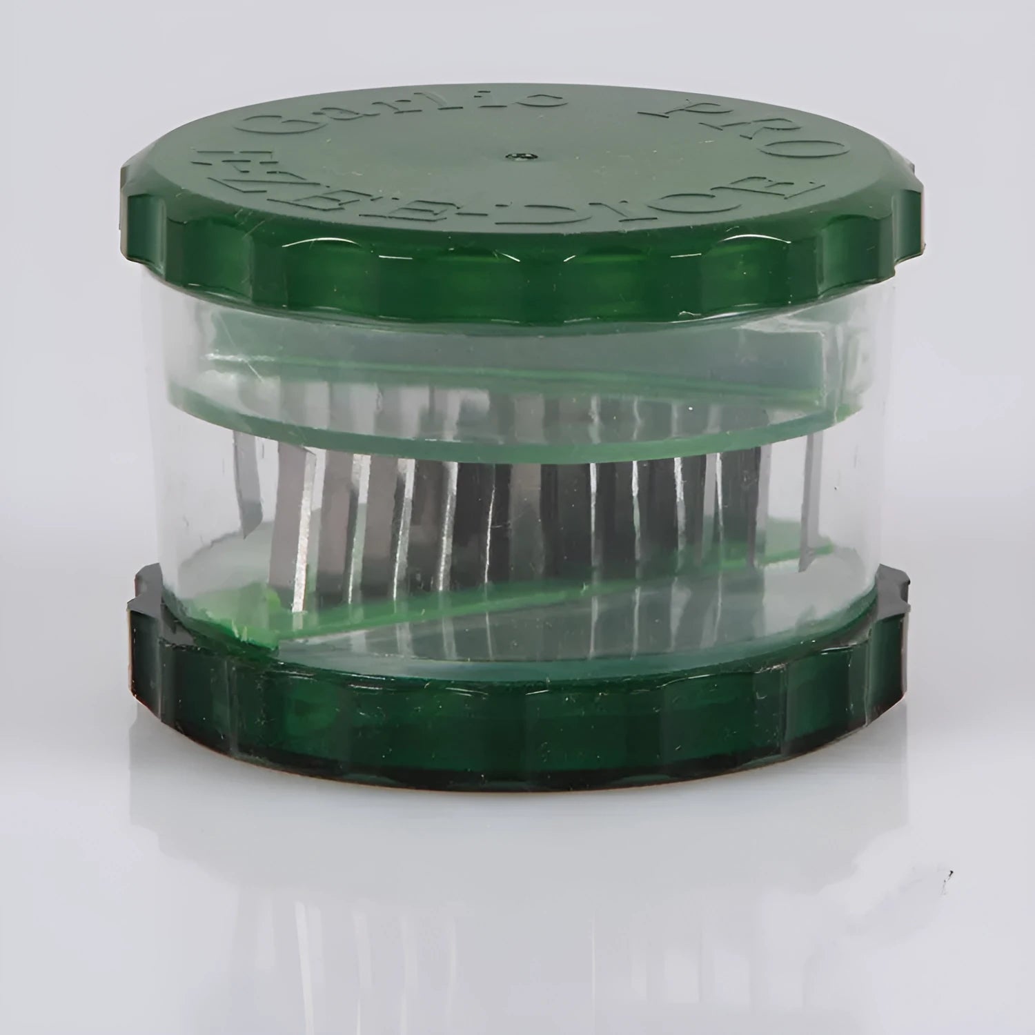 Green transparent PP plastic garlic peeler kitchen gadget measuring 8.5cm.