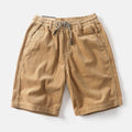 Men's khaki cargo shorts with straight leg cut and retro American street style