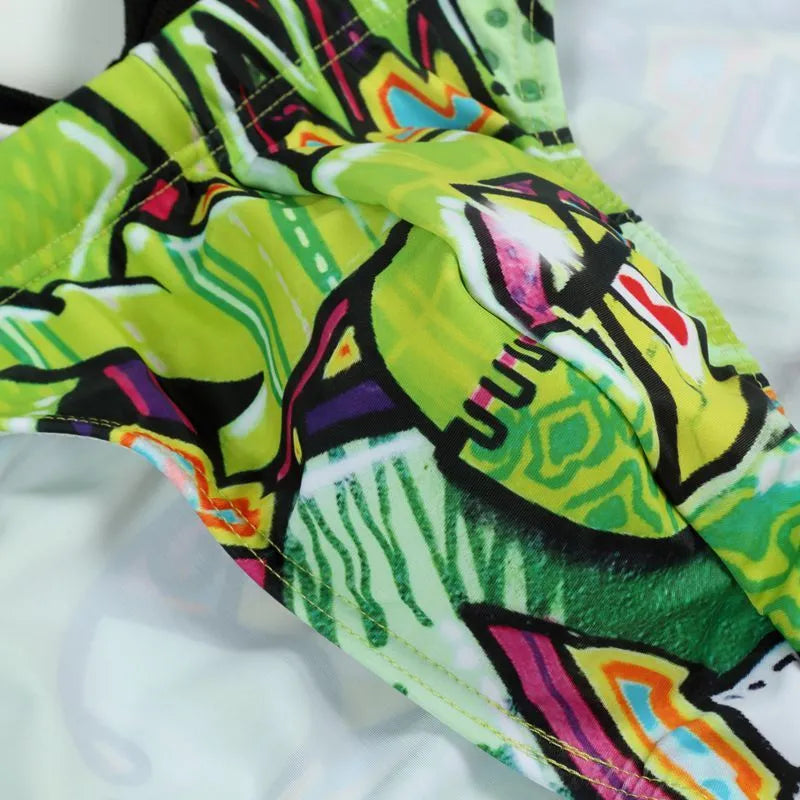 Men's printed swimming trunks in polyester available in Cyber, Ice Cream, Streamer, and Skull patterns