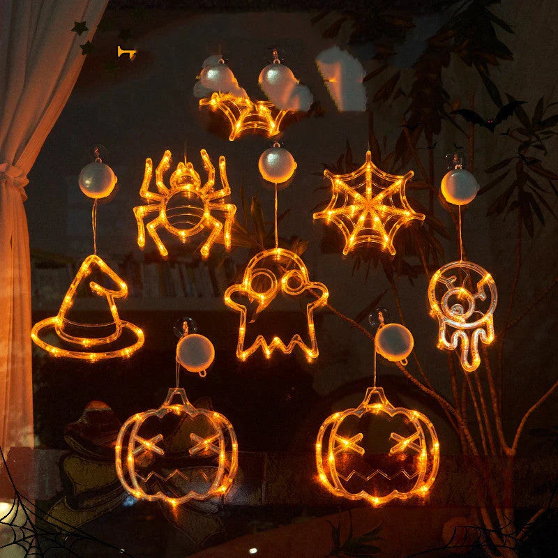 Spooky Halloween window hanging lights featuring pumpkins, spiders, and ghostly figures for a festive atmosphere