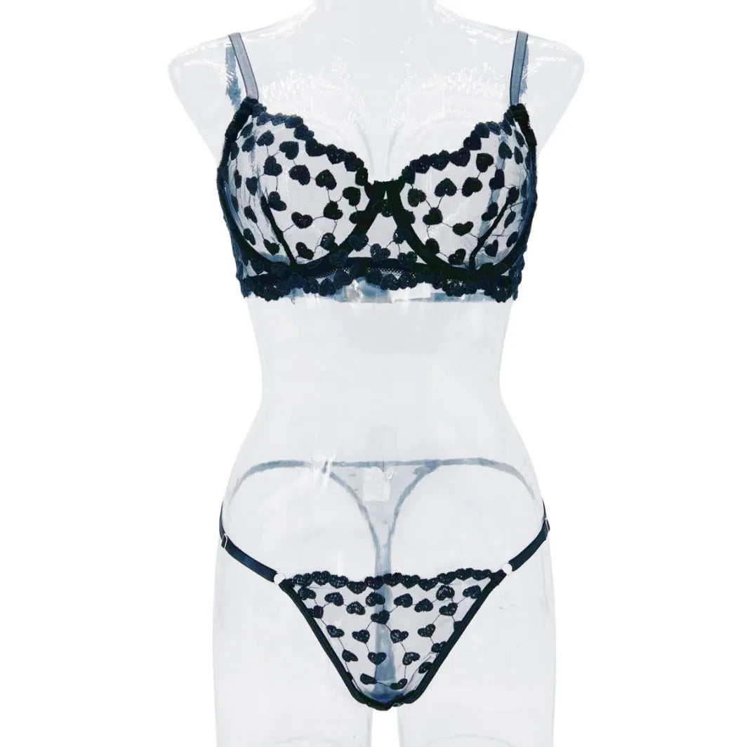 Romantic Love women's mesh two-piece suit in black or red, showing top and matching trousers.