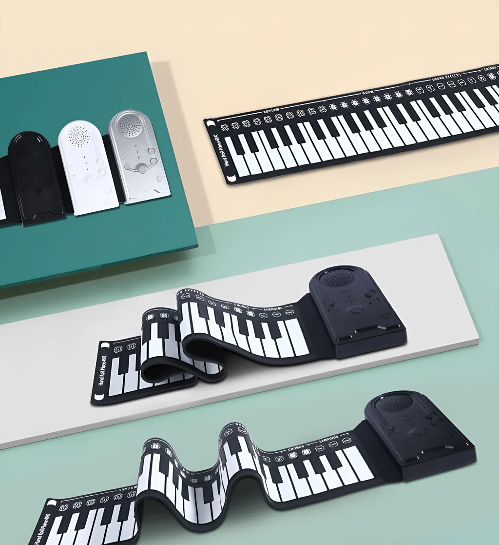 Compact folding electronic keyboard with 49 black silicone keys, shown in gloss black finish, rolled for storage next to its control panel.