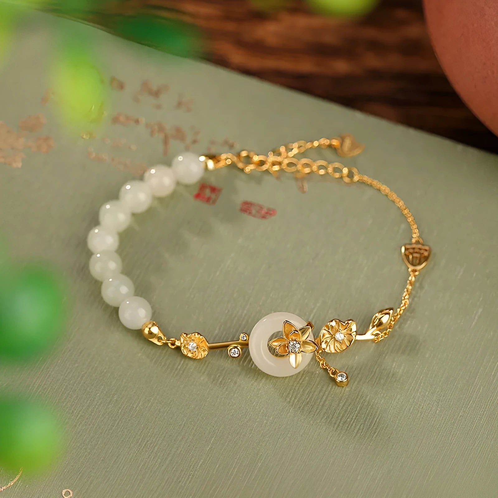 Women's Hetian jade and 925 silver peace buckle bracelet with lotus motif