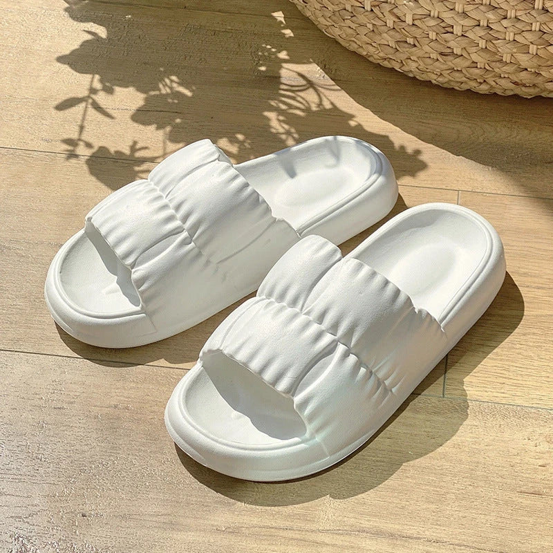 Plush Bathroom Slides in various colors and designs, featuring a soft, comfortable EVA sole and breathable upper material.