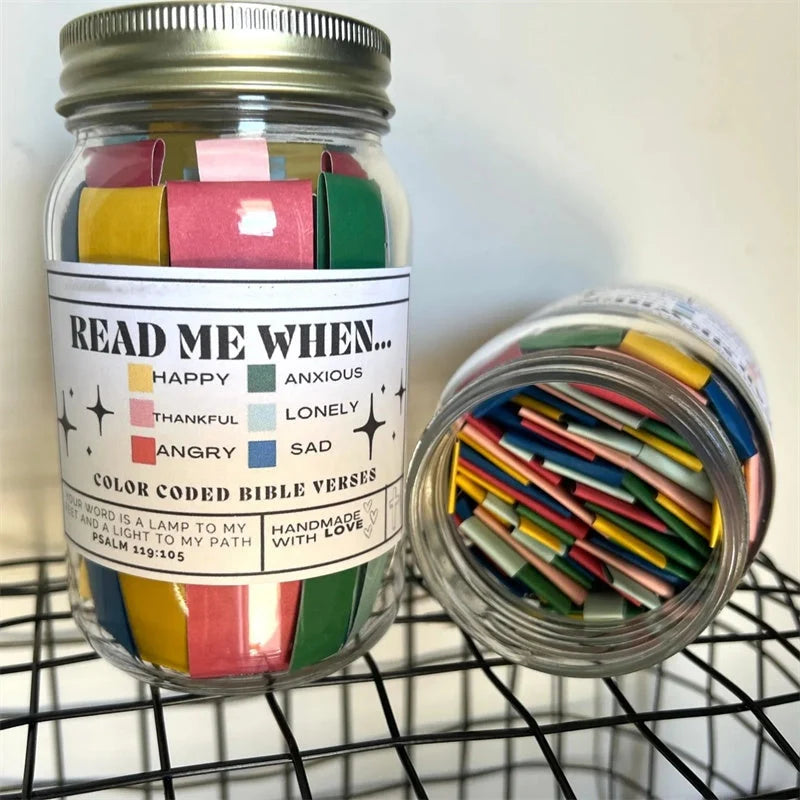 Handmade glass jar containing 67 color-coded Bible verses for emotional support
