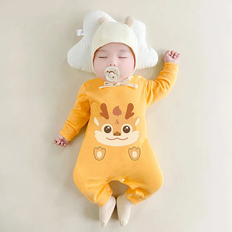 Cotton long sleeve baby jumpsuit in size 73cm with fun print, neutral unisex design for spring autumn