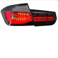 BMW 3 Series tail light assembly with LED running light strips in smoked black lens option