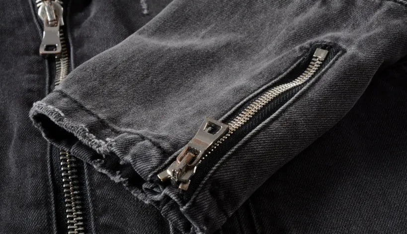 Black slim-fit linen denim jacket with lapel collar and front zipper placket on plain background