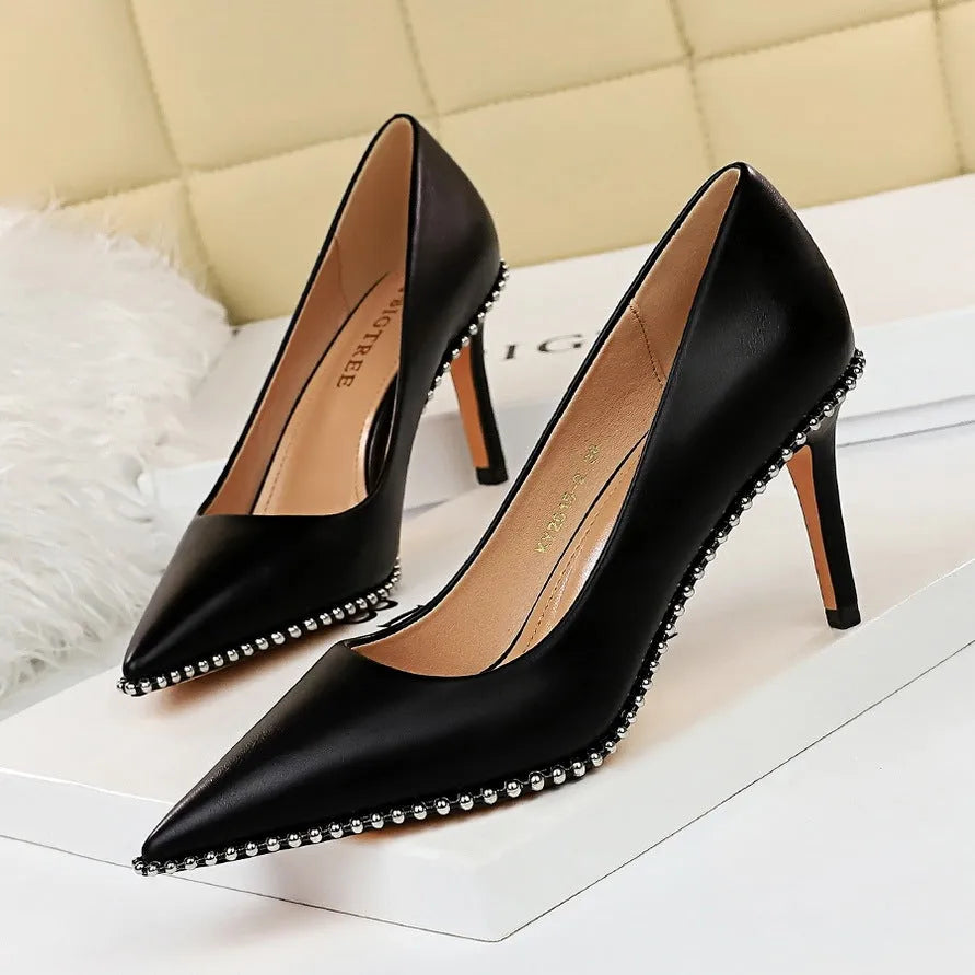 Studded high heels with rivet and metal chain detail, 10.5cm heel, black PU upper