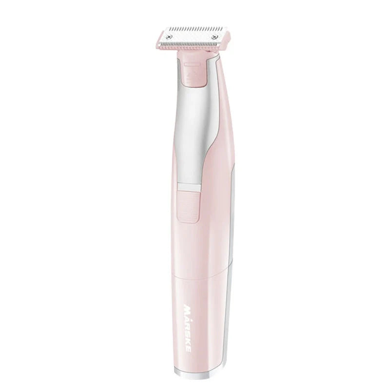 Portable hair shaver in pink and green with detachable comb for precise styling
