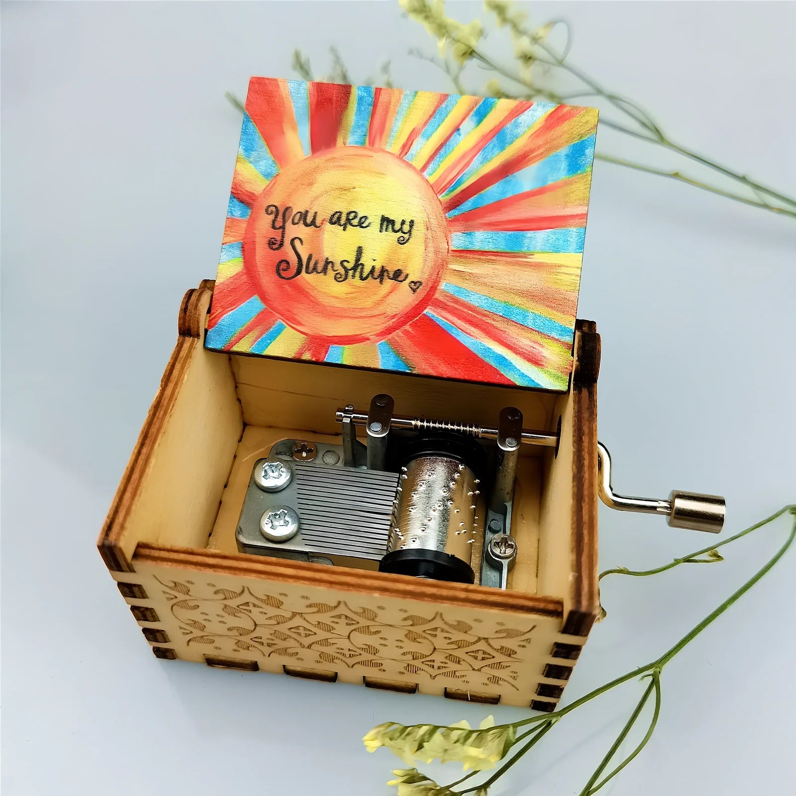 Antique boxwood music box with hand crank and yin carved Spirited Away landscape flowers, 10 cm tall wooden decoration