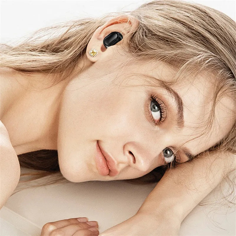 Black TWS XT01 Bluetooth earphones with charging case showing digital display