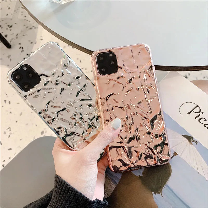 Clear electroplated rose gold iPhone back cover case on an iPhone 15 Pro Max.