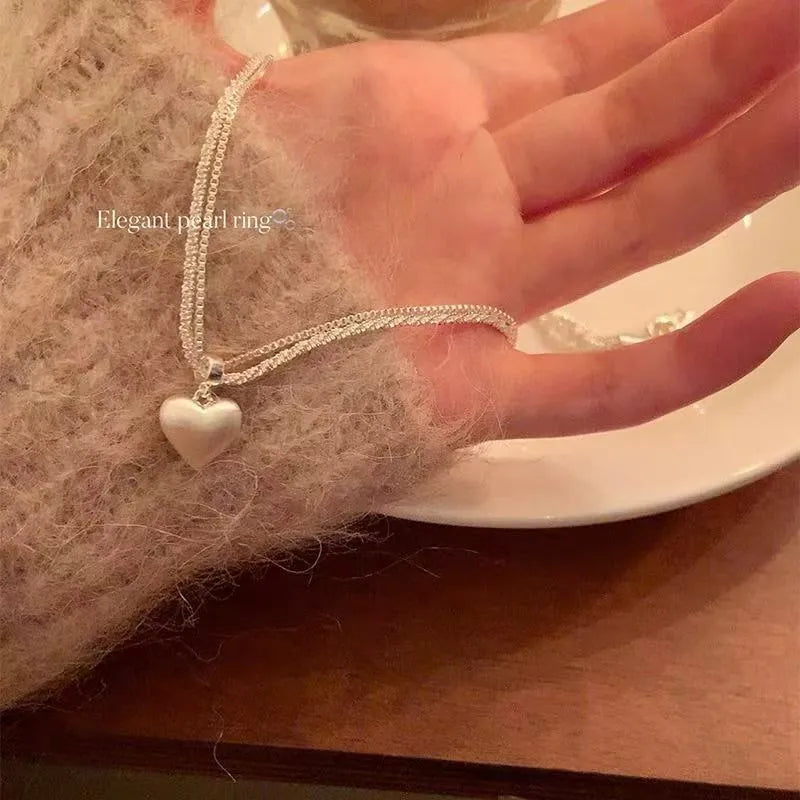 Double-layer brushed heart pendant necklace on silver-colour chain