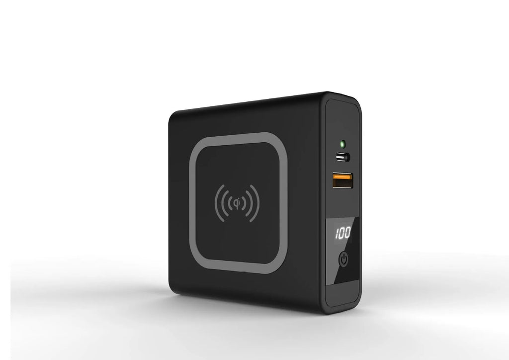 Black Super QI wireless power bank with integrated international plug adapters showing PD20W fast charging port.