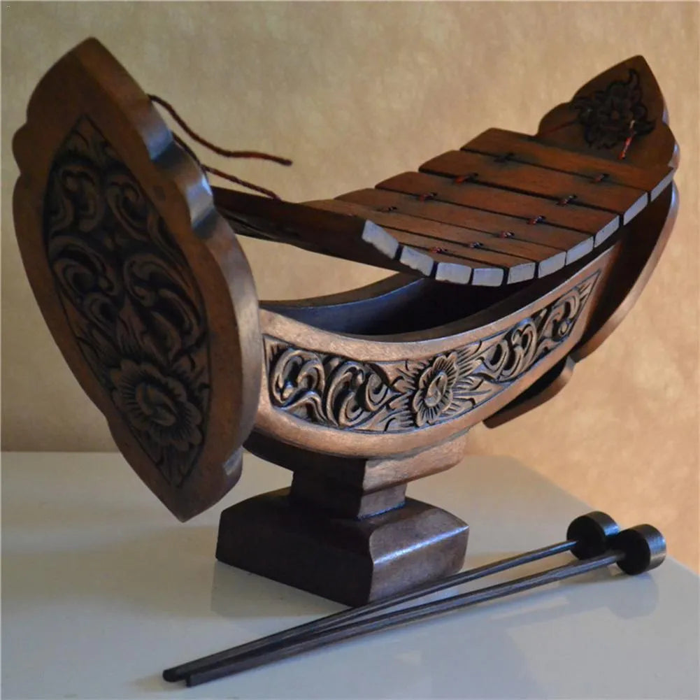 Brown wooden hand xylophone decorative pendant measuring 27x16cm in Southeast Asian style