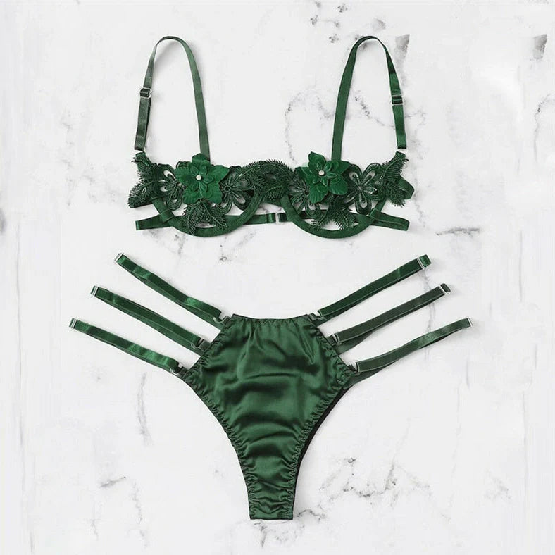 Women's black floral half-cup bra and brief set with fitted straps and back closure