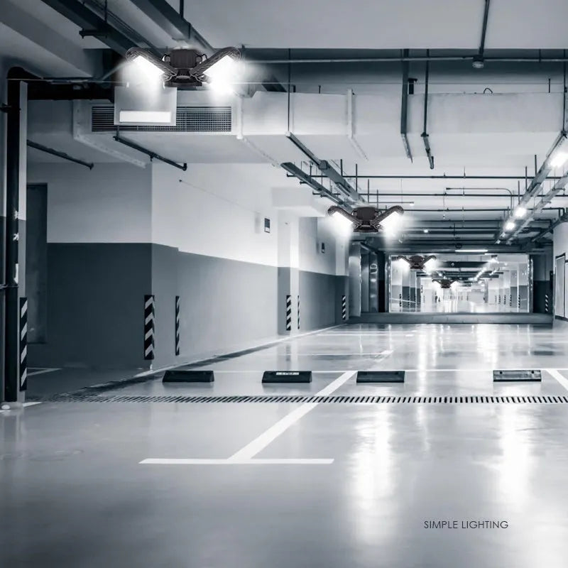 60W deformable LED garage light with three adjustable aluminium alloy heads on a white background