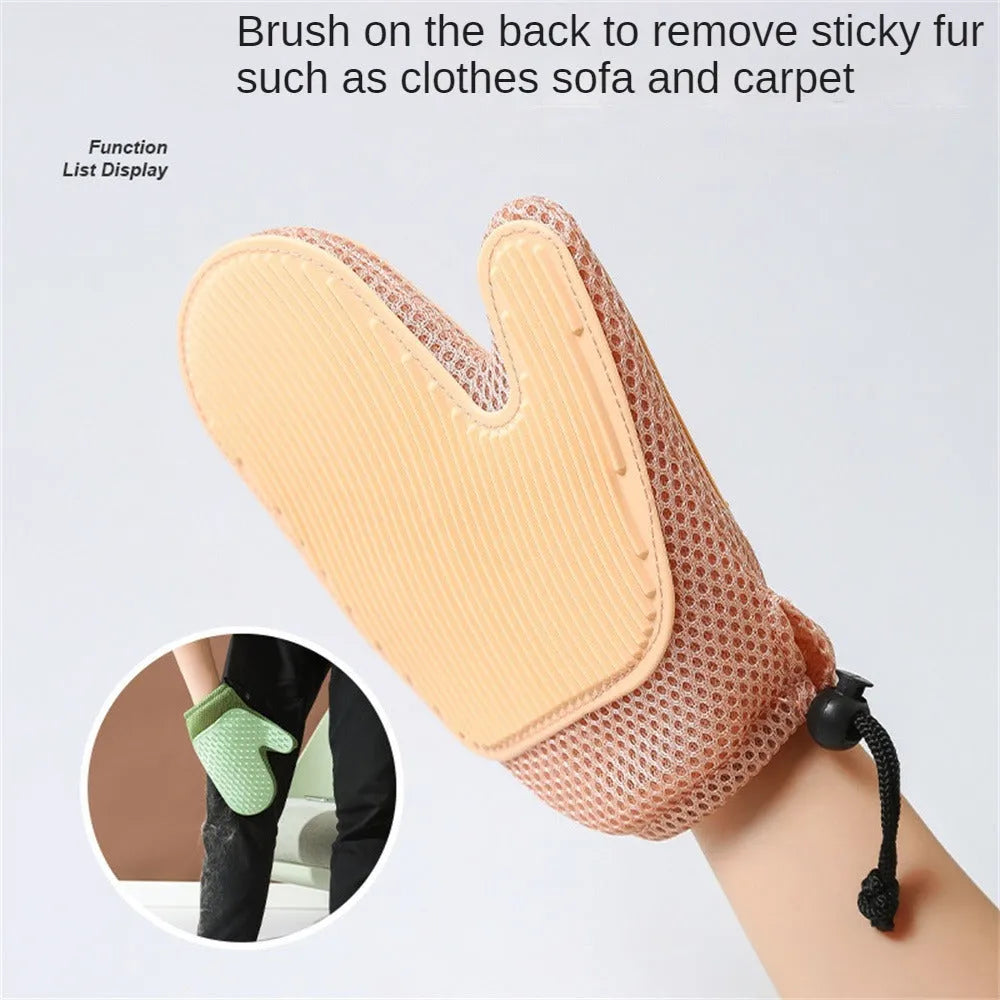 Dark blue mesh pet hair remover glove shown on a hand, with loose pet hair collected on its surface