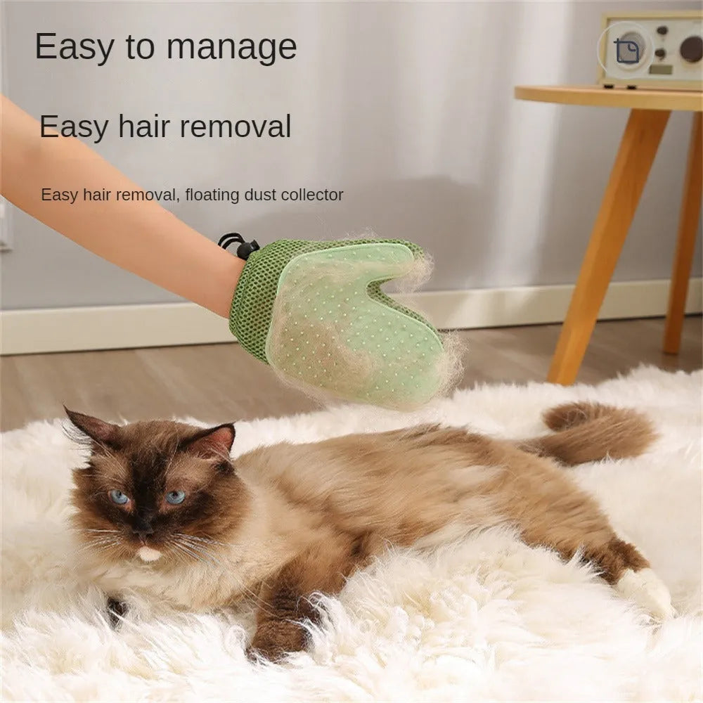 Dark blue mesh pet hair remover glove shown on a hand, with loose pet hair collected on its surface