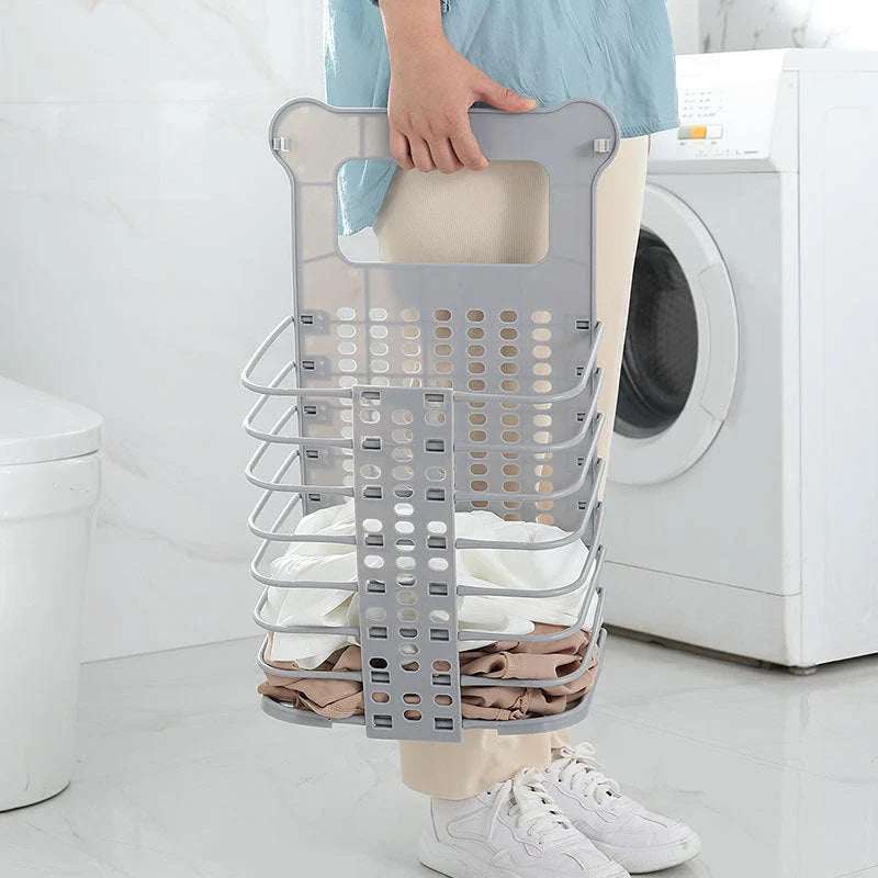 Versatile foldable laundry hamper with handle, made of durable PP material for wall-mounted storage and easy transport