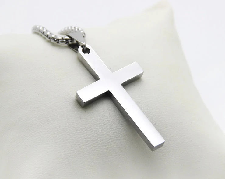 Simple stainless steel cross necklace with adjustable chain, perfect for everyday wear