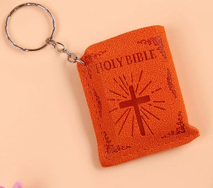 Mini Holy Bible Keychain with Jesus Cross in PVC colour leather, dimensions 4.5x6.0cm