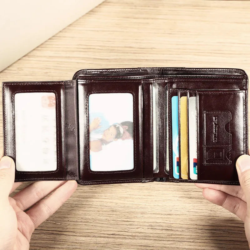 Men's leather wallet showing internal compartments including photo window, card slots and coin pouch