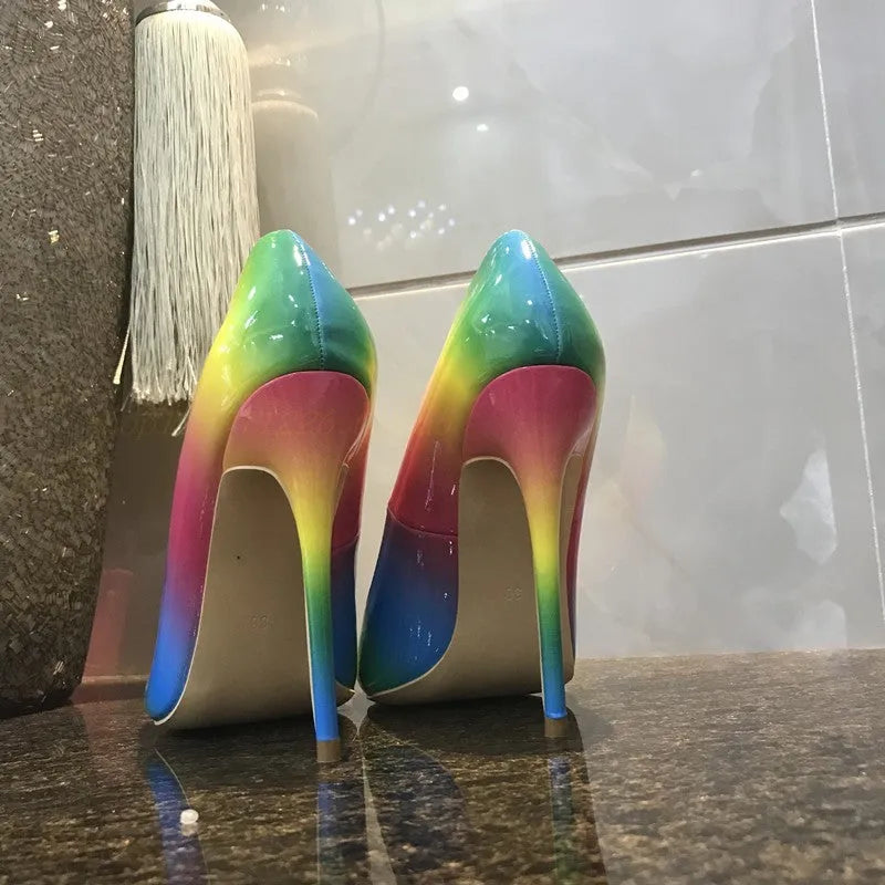 Rainbow patent leather women's ultra-high heel shoes with pointed toe and thin heel.
